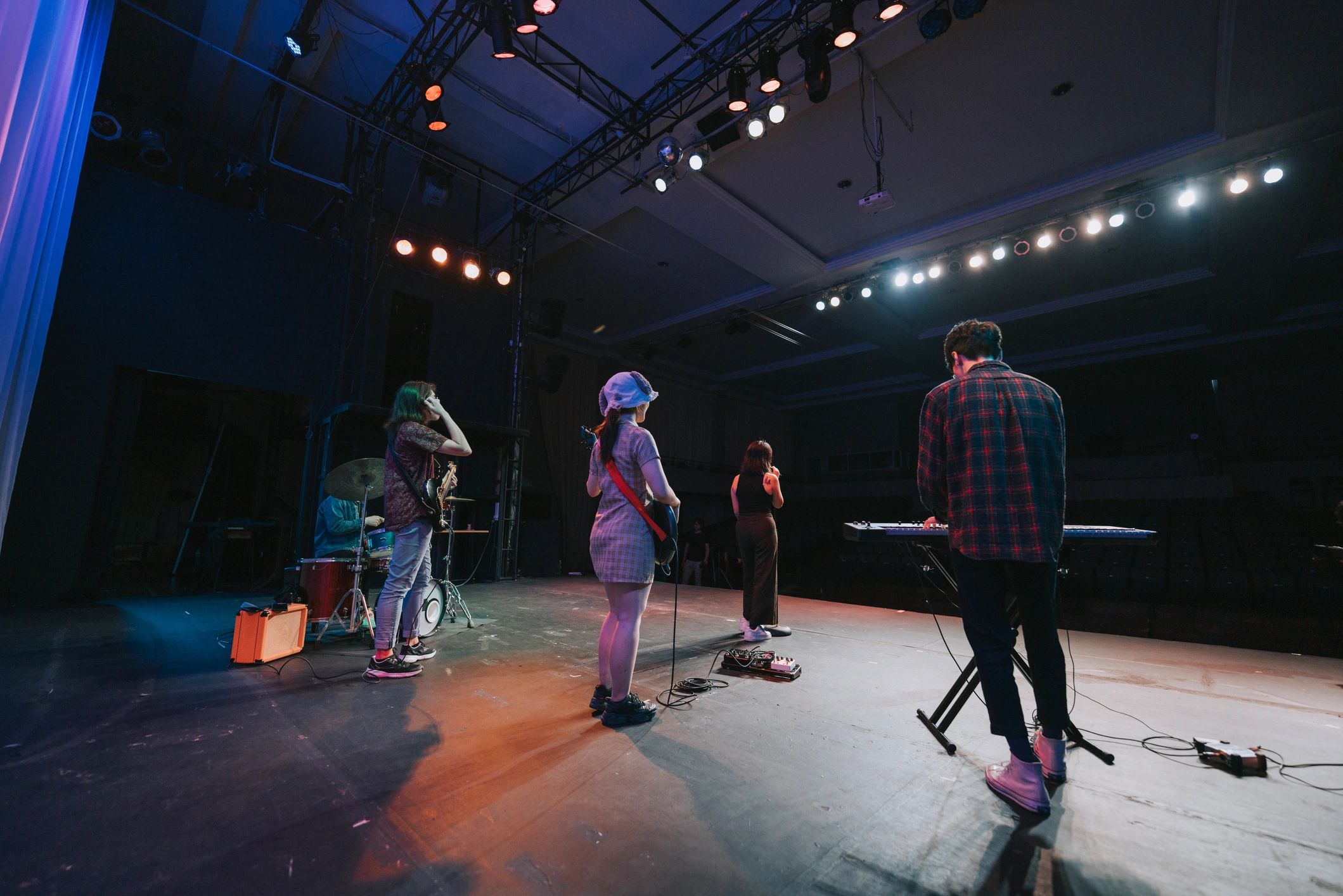 Live stage performance with band and singer
